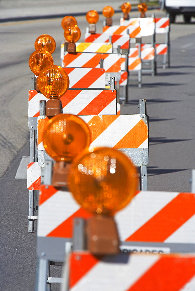 Row of traffic barricades with lights