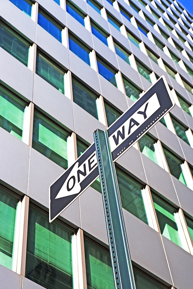 Low angle view of One Way sign