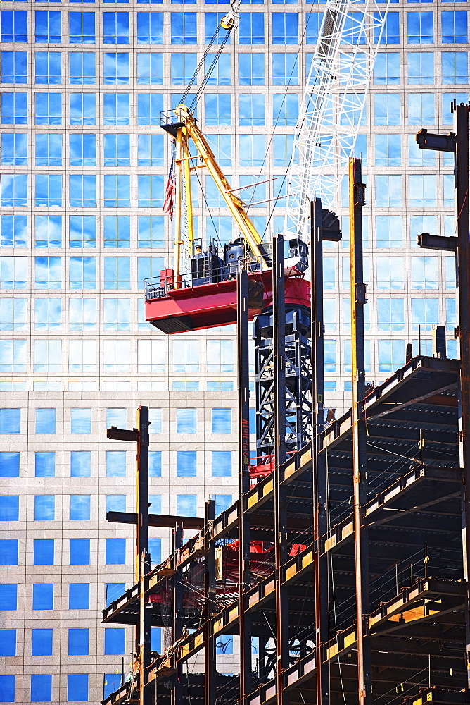 Urban construction site with crane