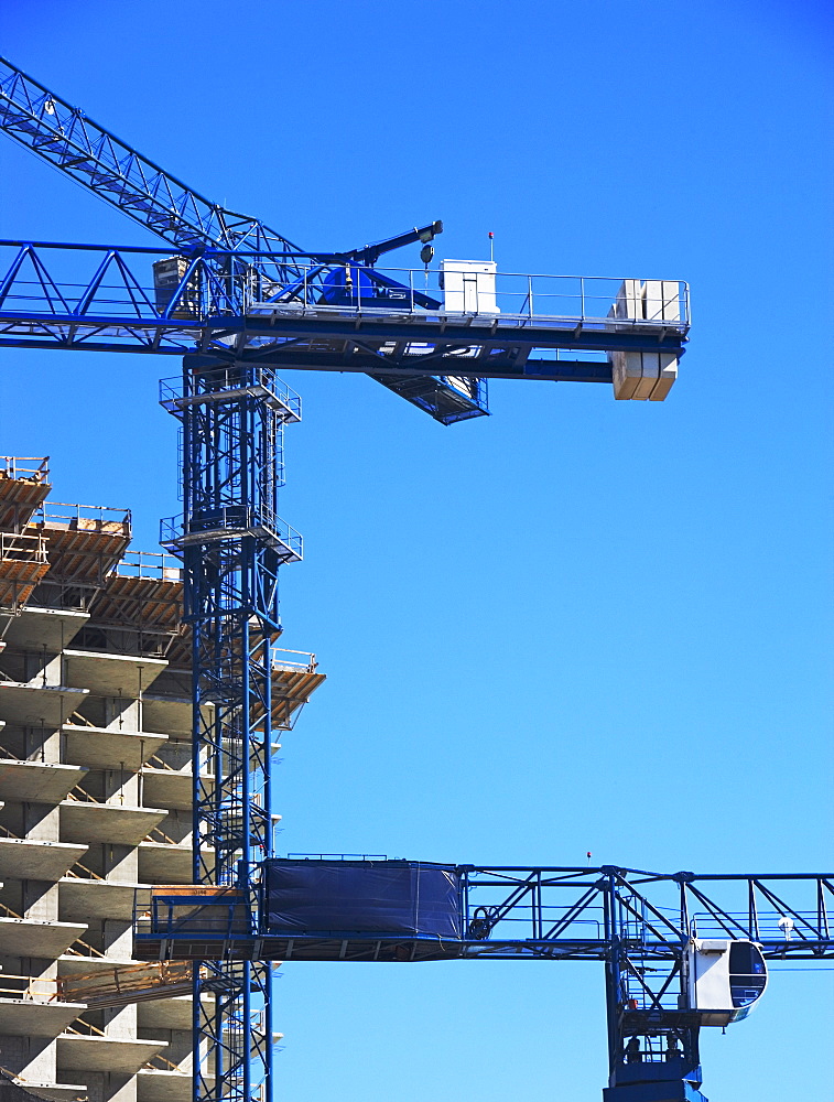 Building under construction and crane