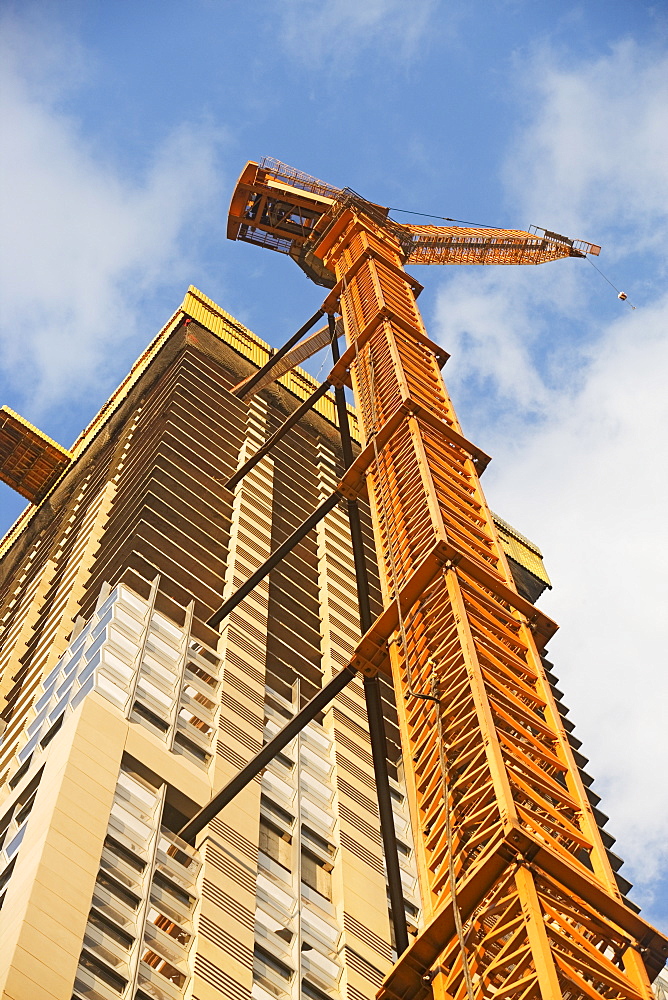 Crane and high-rise building