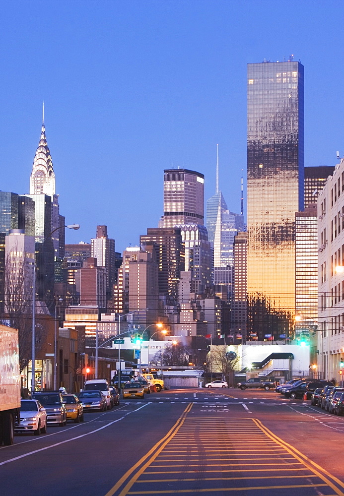 USA, New York State, New York City, city street with skyscrapers in background