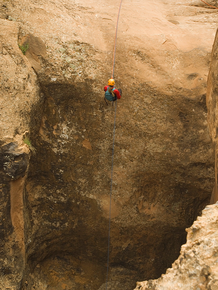 Man canyon rappelling