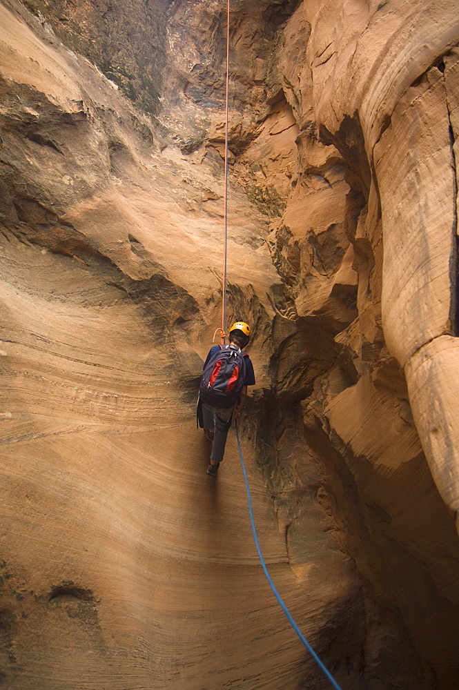 Person canyon rappelling