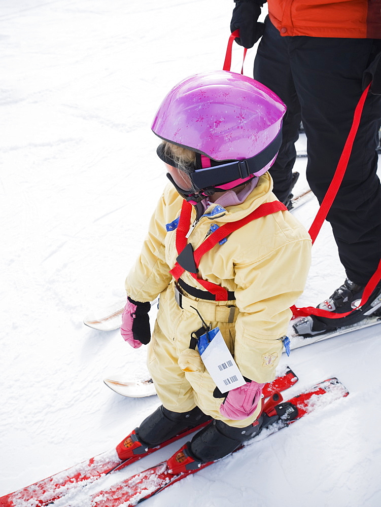 Parent and child skiing