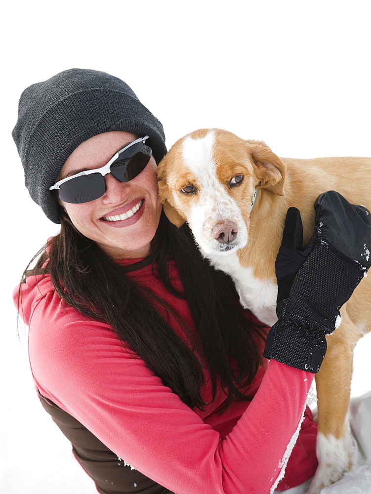 Woman hugging dog