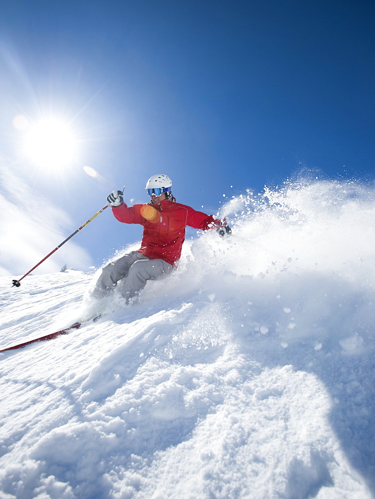 Man skiing downhill