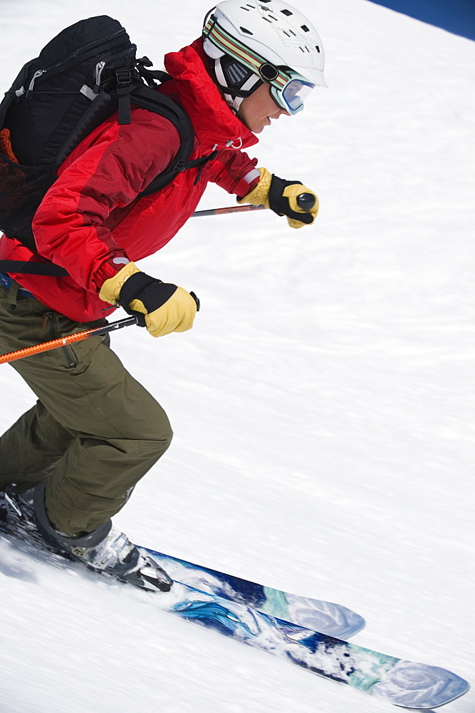 Woman skiing downhill