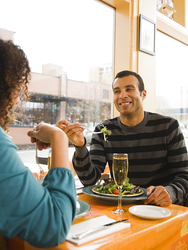 Couple eating in restaurant