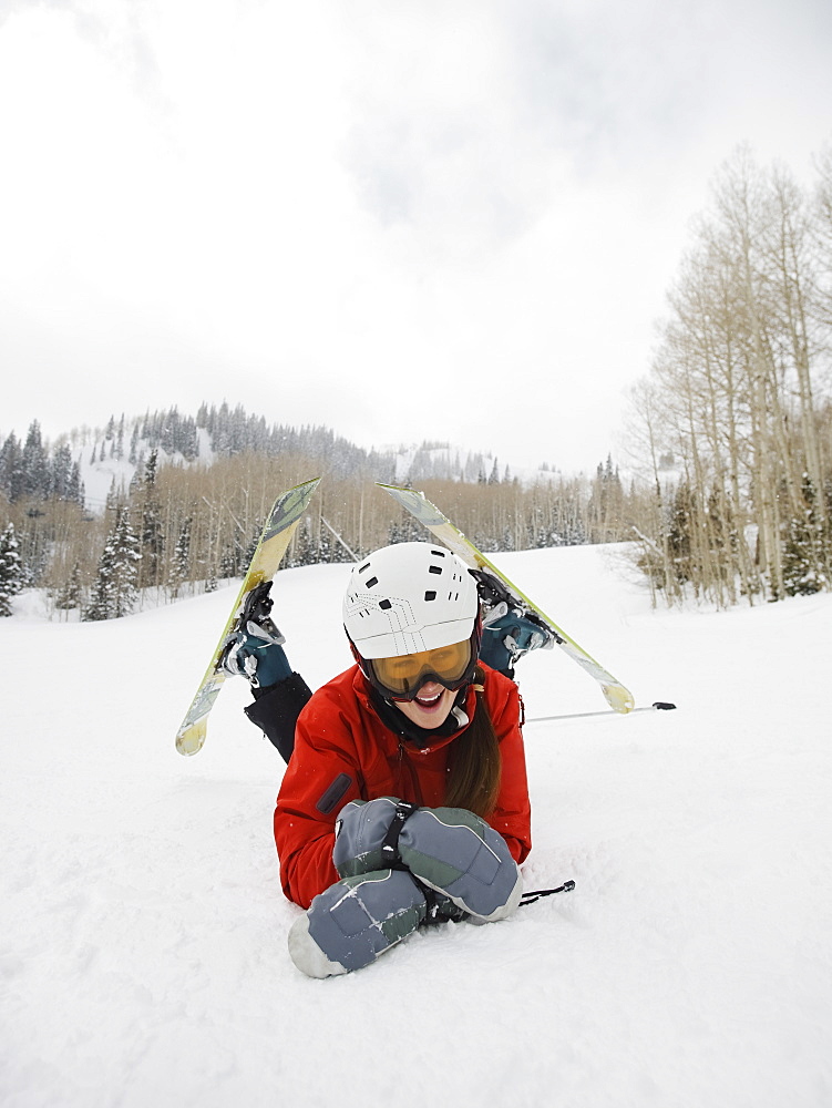 A downhill skier falling