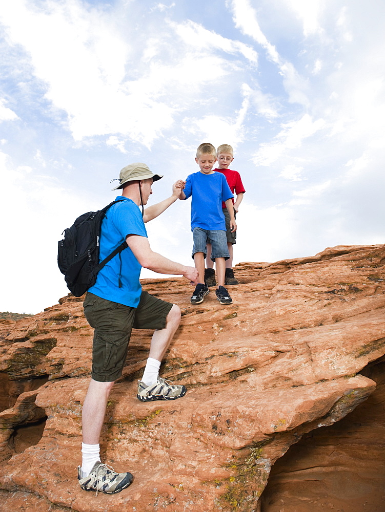 A father and two sons at Red Rock