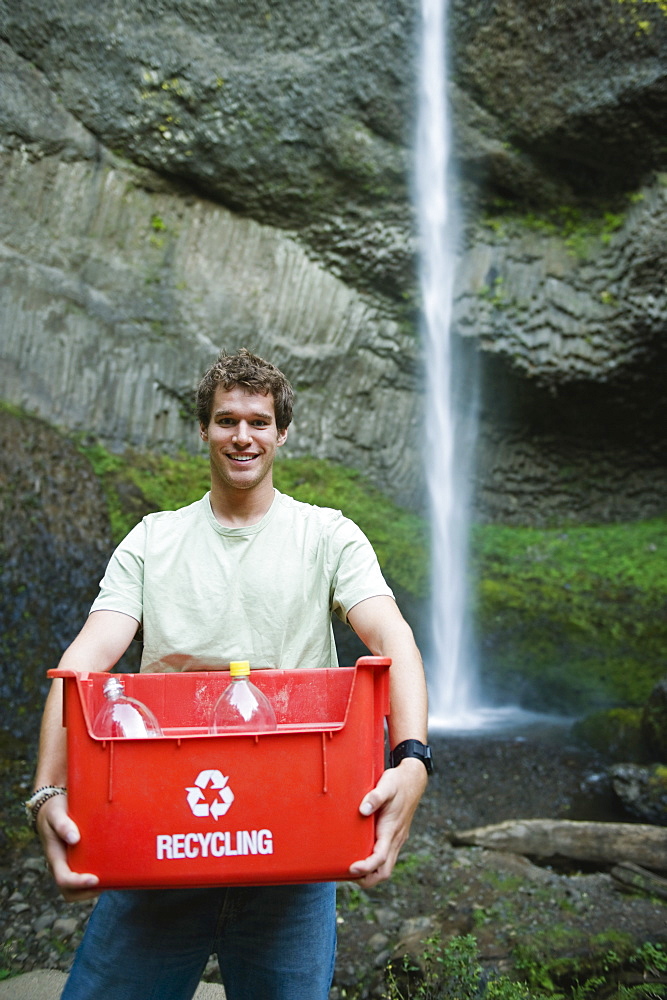 Man with recycling bin