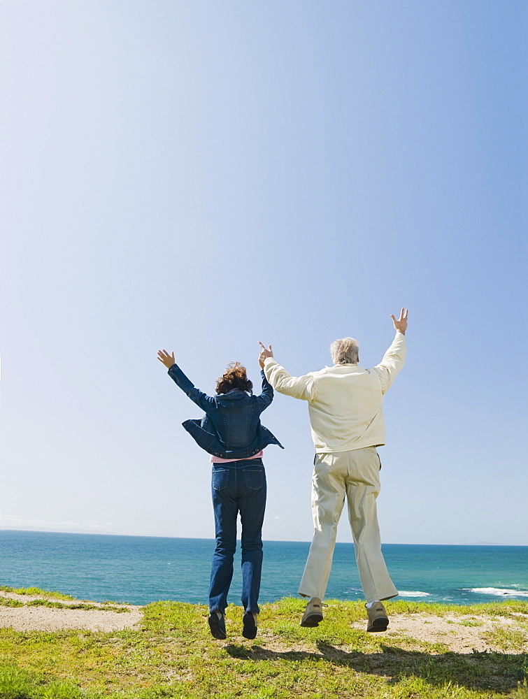 Couple jumping