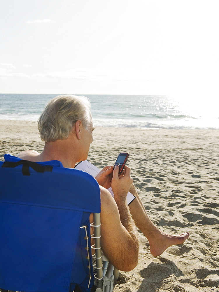 Man relaxing in beach chair