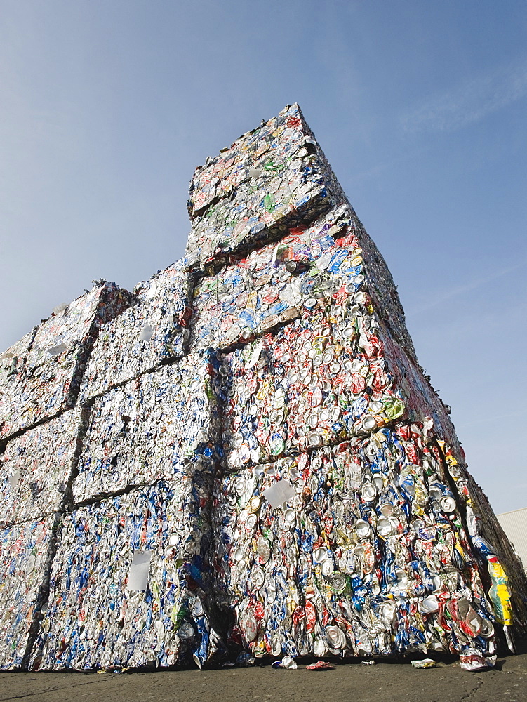 Stacks of crushed aluminum cans