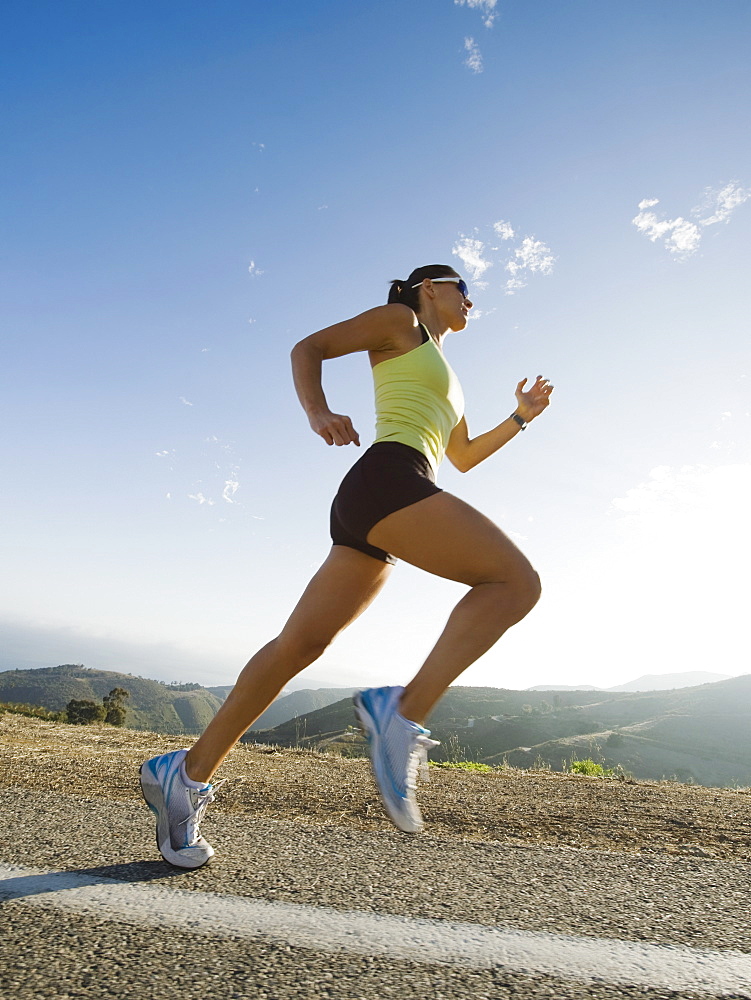 Runner training on a road in Malibu