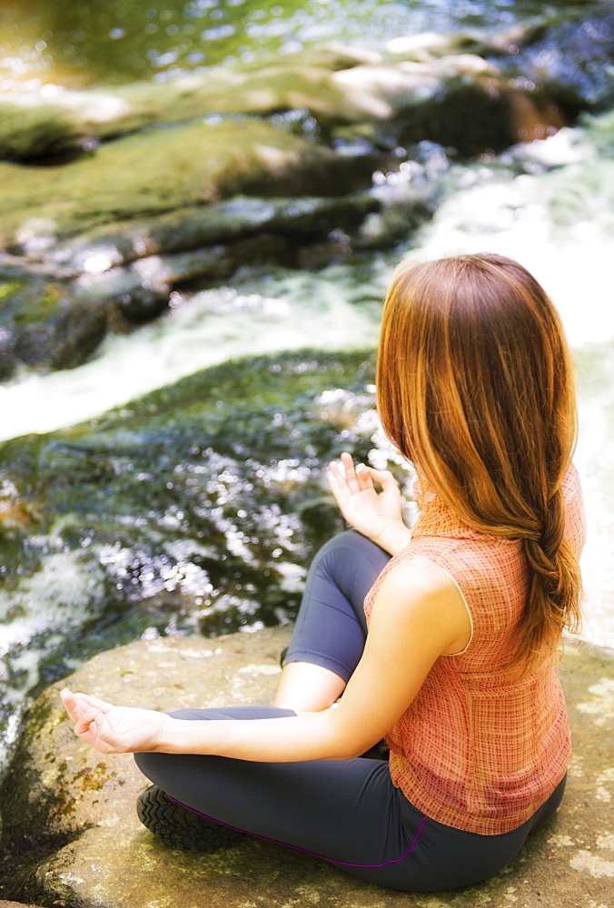 Woman practicing joga in forest, USA, New Jersey, Mendham