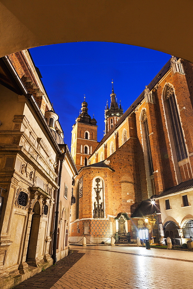 Low angle view of St. Mary's Church and St. Barbara Church from under passage arch, Poland