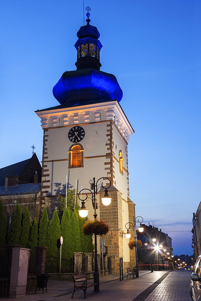 Bell Tower and empty sidewalk at night, Poland