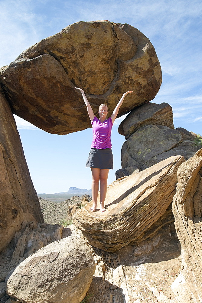 Woman visiting Balanced Rock, Balanced Rock Big Bend National Park Grapevine Hills, Texas 