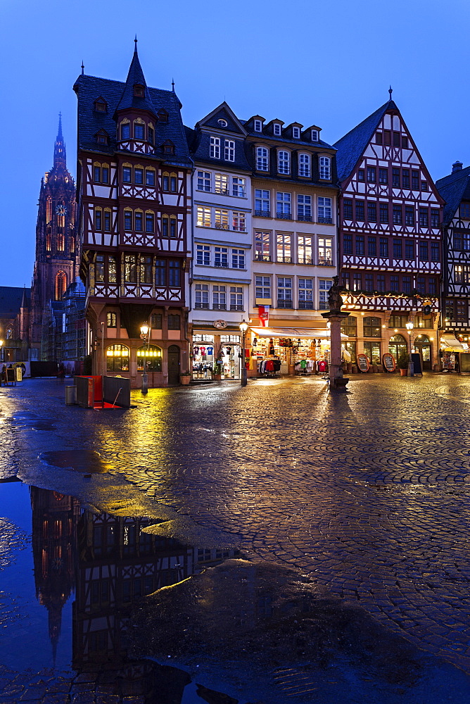 Illuminated townhouses and square, Germany, Hesse, Frankfurt, Romerberg Plaza,Frankfurt Cathedral