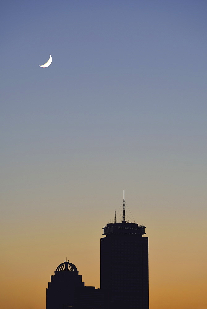 Crescent moon above office buildings, USA, Massachusetts, Boston, Back Bay