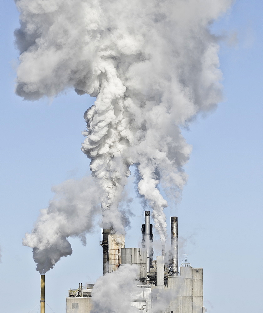 Smoke stacks emitting smoke, USA, New York State, Ticonderoga