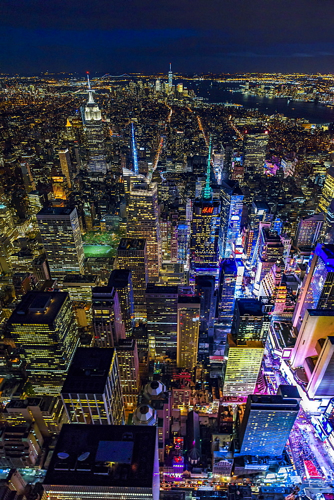 USA, New York, New York City, Manhattan, Aerial view of illuminated skyline with Times Square at night