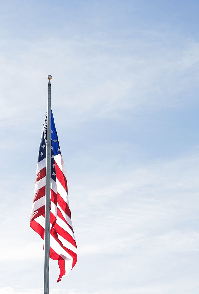 American flag against blue sky