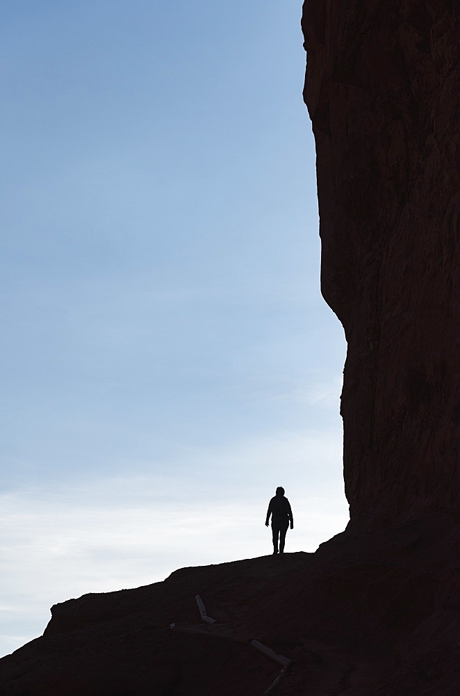 Woman's silhouette by Fisher Towers in Utah, USA