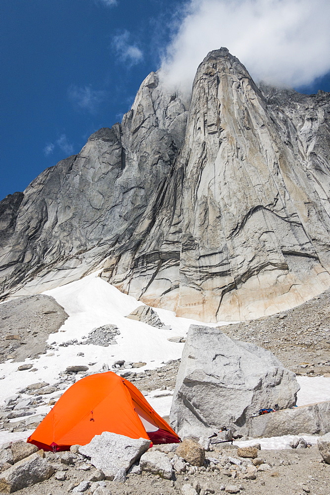 Orange tent in Purcell Mountains, Bugaboo Provincial Park, British Columbia, Canada