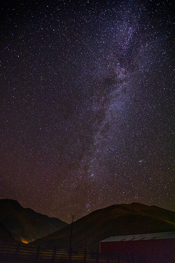Milky Way galaxy over mountains