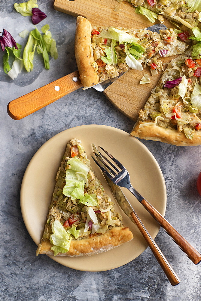 Pizza topped with cabbage