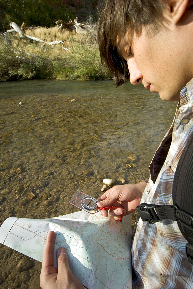 Hiker checking his map