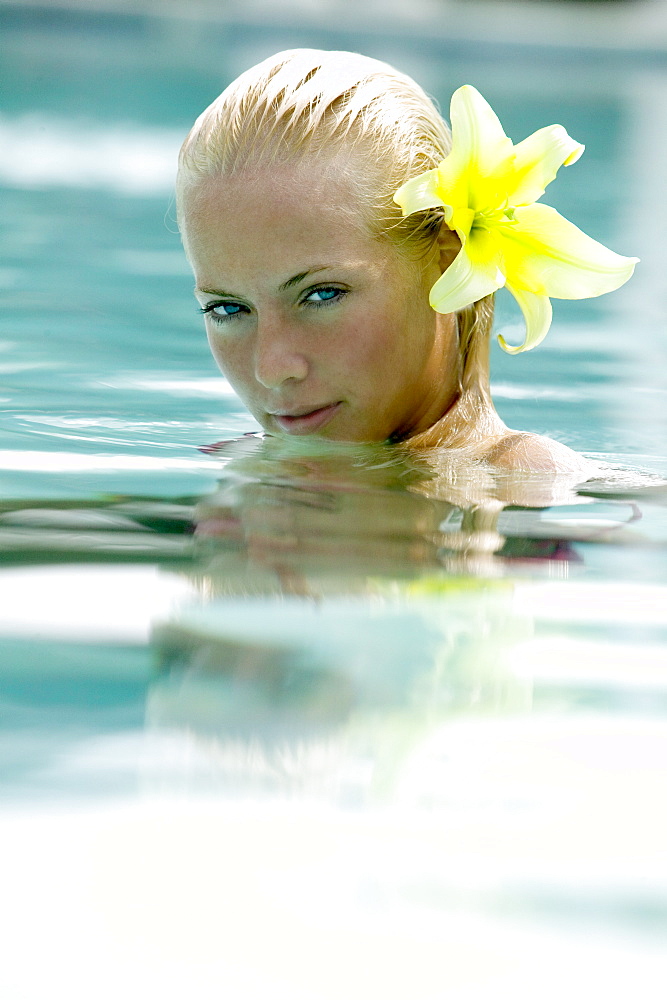 A submerged woman in a swimming pool