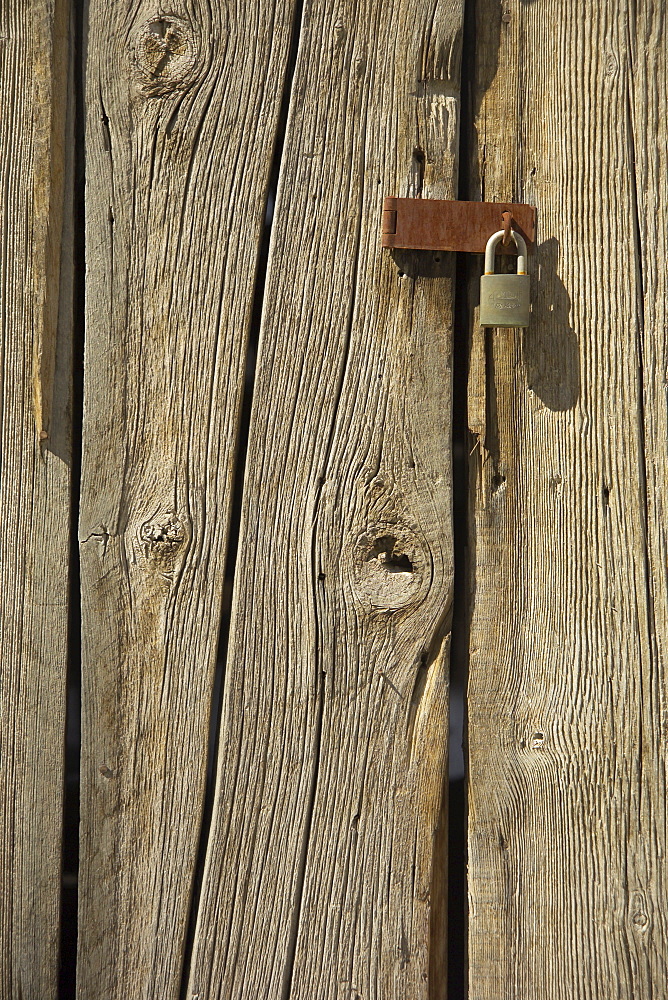 Padlock on a barn door