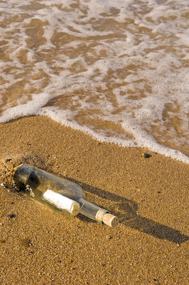 Message in a bottle on beach