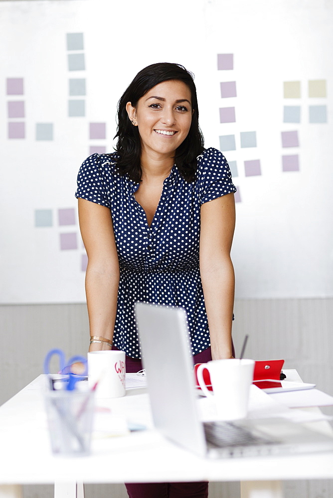 Woman in office of Small Business, Start-up