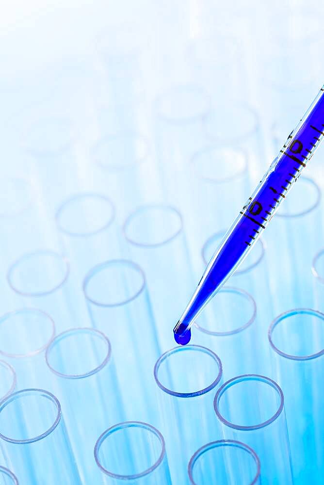 Blue liquid in pipette and test tubes