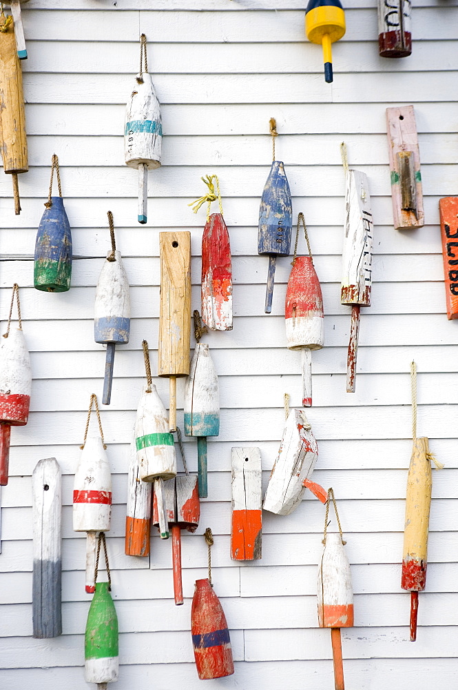 Buoys on a wall in Maine