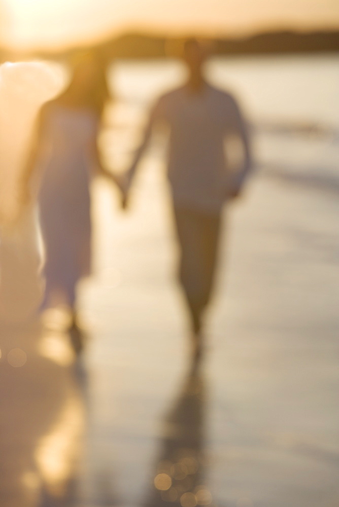 Couple strolling on a beach