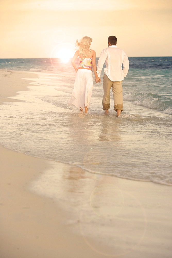 Couple strolling the beach