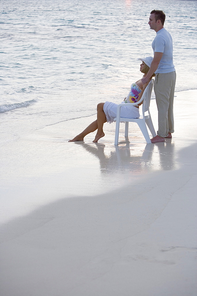 Couple relaxing at the beach