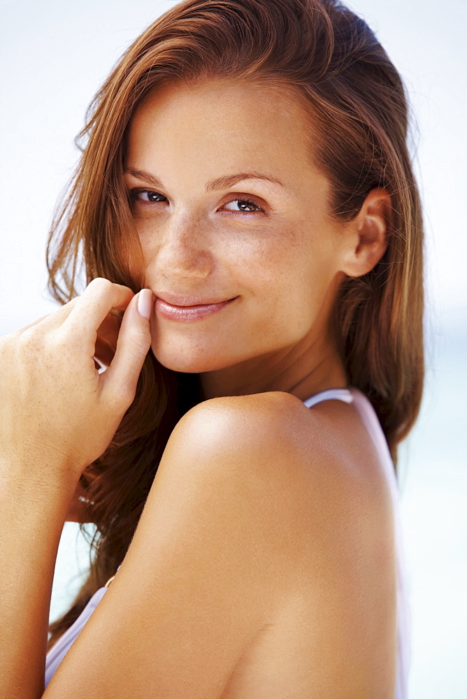 Portrait of young woman in bikini