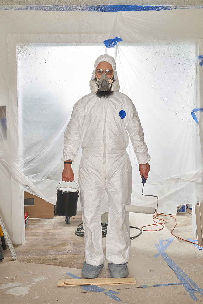 House Painter wearing protective suit and mask