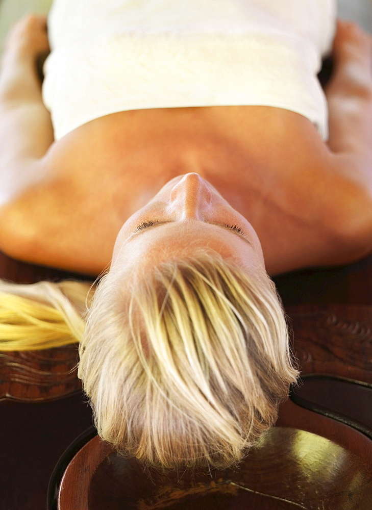 Woman relaxing in spa