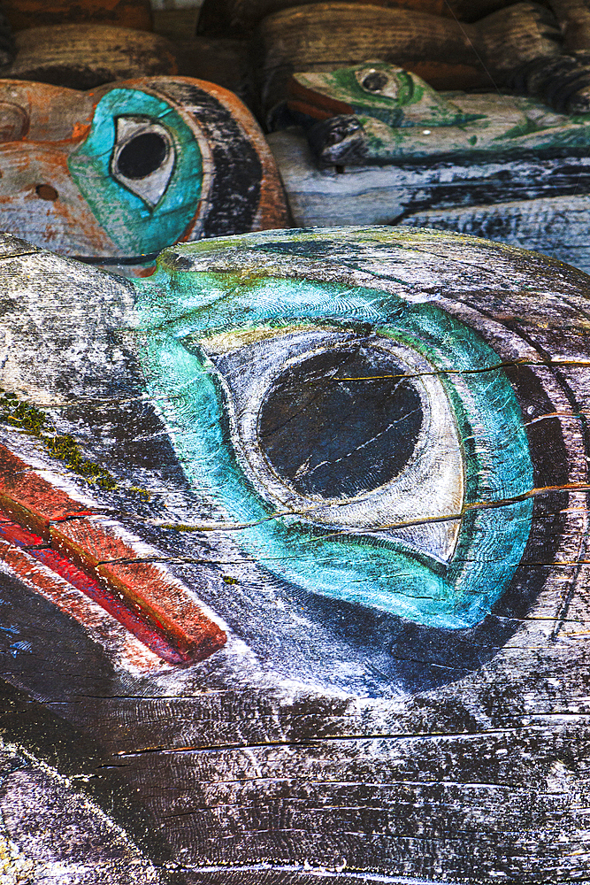 Close-up of weathered totem poles