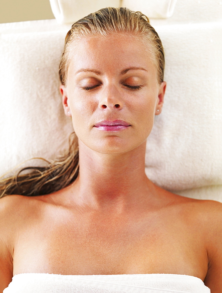 Woman relaxing in spa