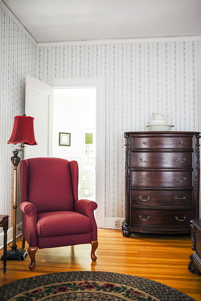 Empty room with armchair