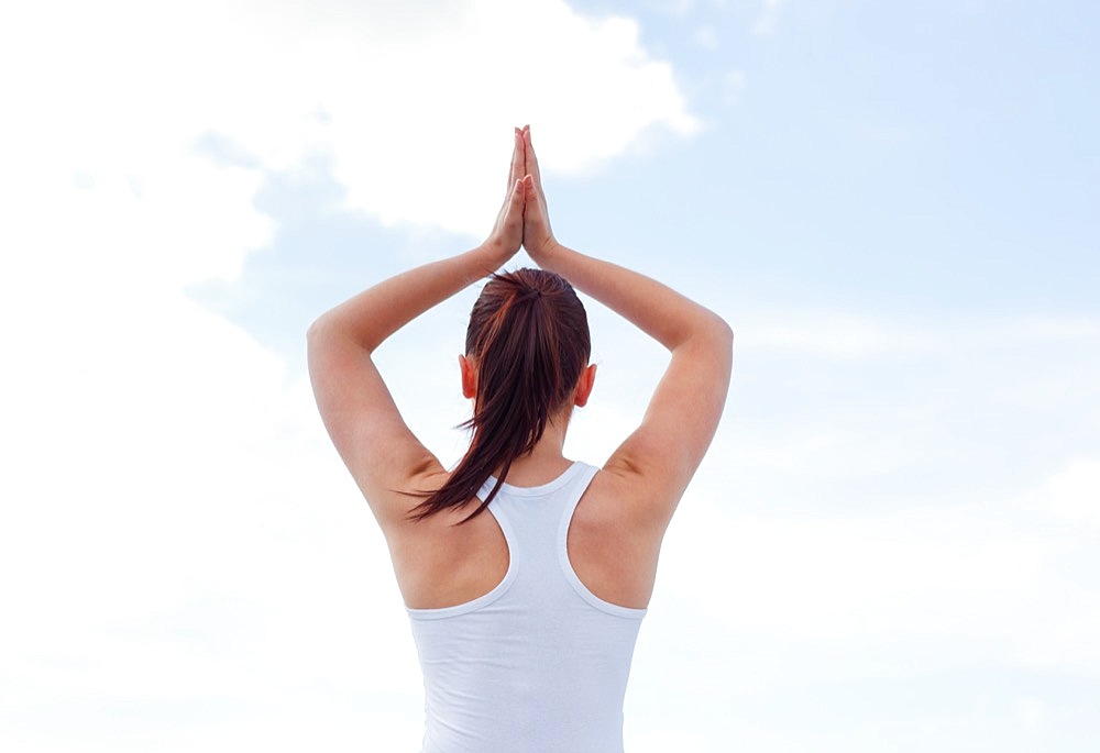 Young attractive woman doing yoga